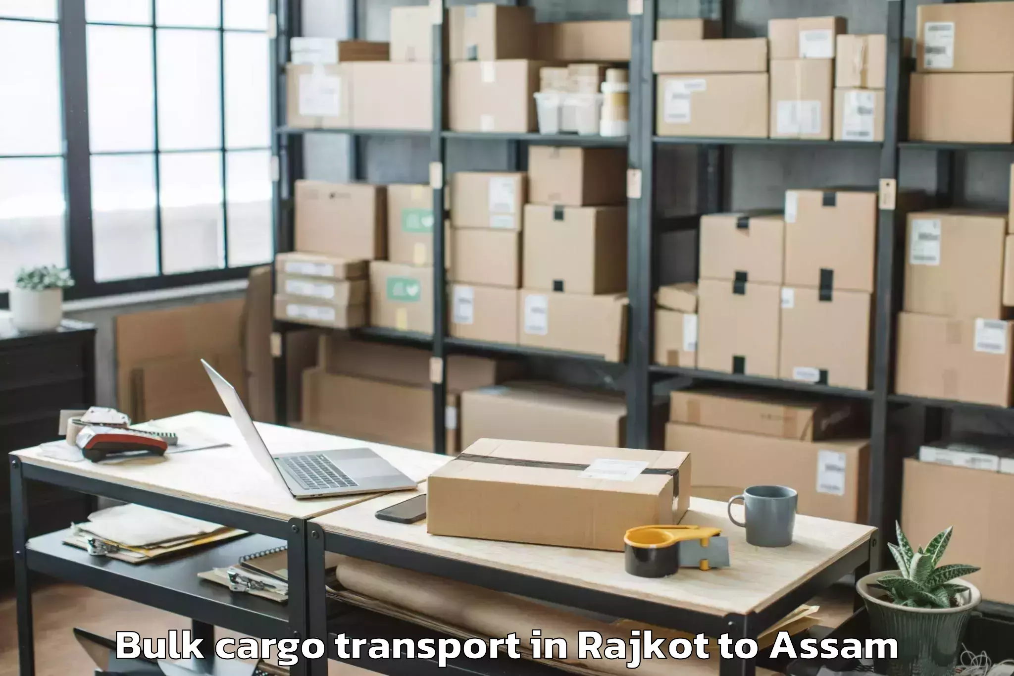 Book Rajkot to Narayanpur Lakhimpur Bulk Cargo Transport